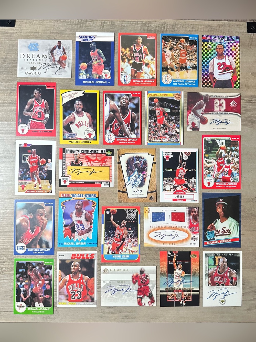 Michael Jordan Signed Rookie Lot of (25) Star Fleer Upper Deck Novelty Cards.